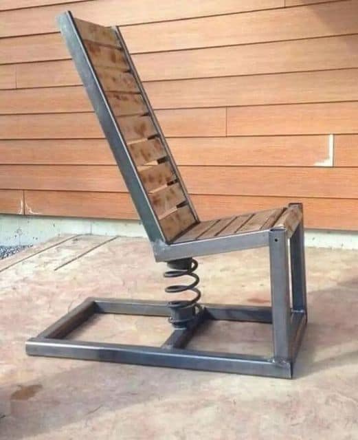 Spring-loaded Chair: Innovative Design Blending Wood And Metal